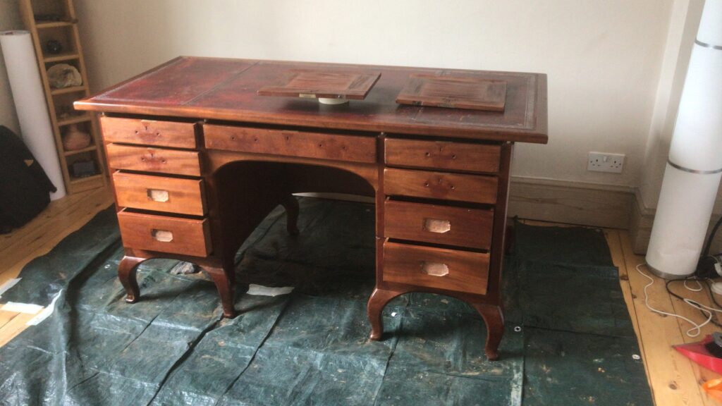 Victorian mahogany pedestal desk with nine drawers on cabriole legs awaiting restoration